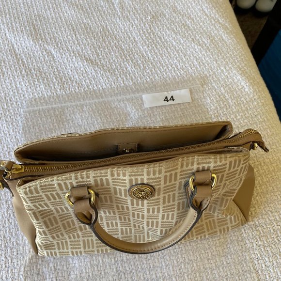 Anne Klein Engraved Lion Logo Gold-Tone Zippered Clutch - Picture 9 of 9